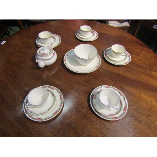 4081 - Aynsley tea wares including teacups and saucers, teapot etc., floral and striped border