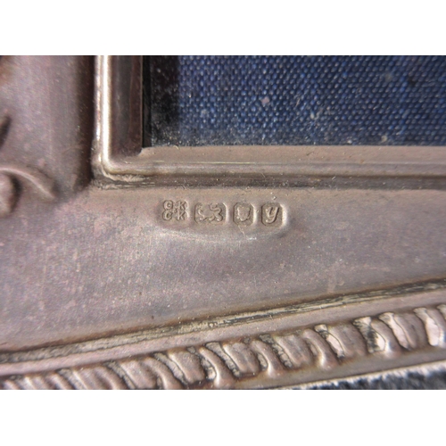 1381 - A silver photograph frame, Victorian style