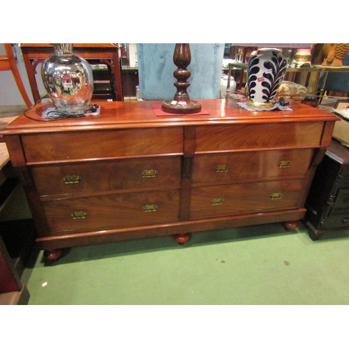 4221 - A circa 1890 late Victorian flame mahogany dresser base having six drawers over turned feet, 95cm ta... 