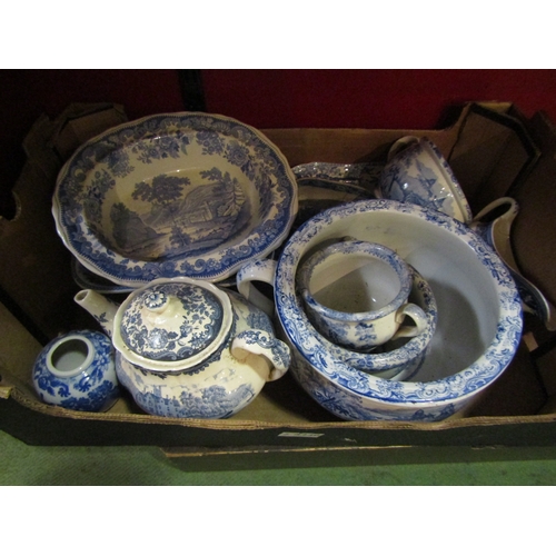 4240 - A box of blue and white china to include a chamber pot, teapot, a 19th Century blue and white 