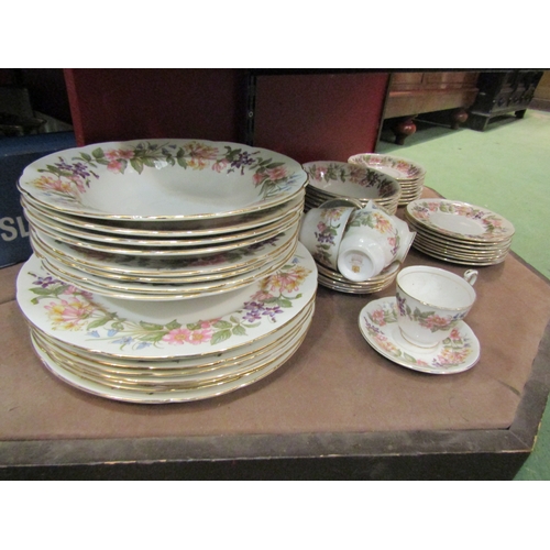 4250 - A Paragon dinner service 'Country Lane' including gravy boat, cups, saucers, veg bowls and meat plat... 