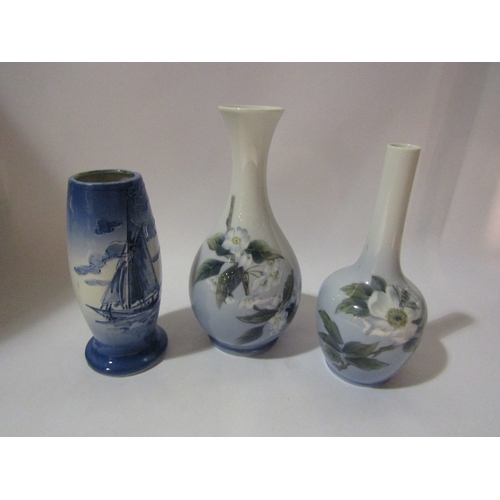 4272 - Two Royal Copenhagen vases, 19.5cm and 21.5cm and another with sail boat  (3)