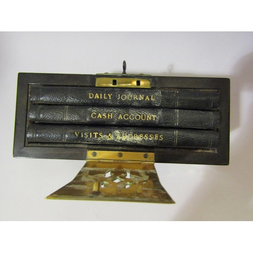 4286 - A Victorian brass-strapped coromandel wood cased set of three volumes: Cash Account, Daily Journal a... 