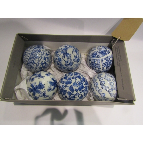 4333 - A set of six blue and white ceramic spheres