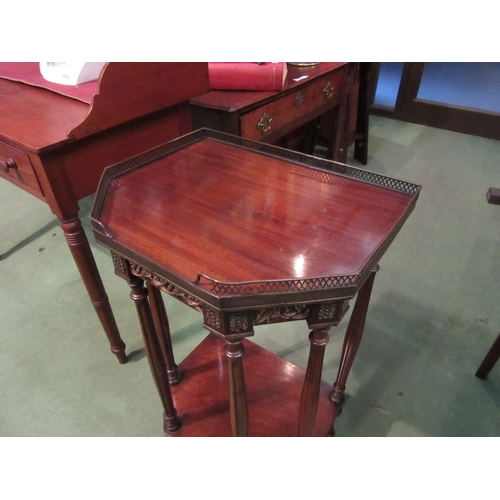 4104 - A late 19th Century French mahogany canted corner side/lamp table, the pierced brass raised gallery ... 