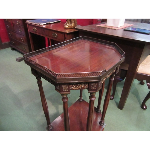 4104 - A late 19th Century French mahogany canted corner side/lamp table, the pierced brass raised gallery ... 