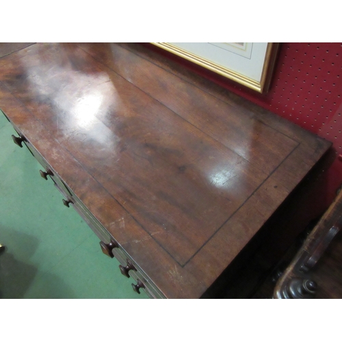 4136 - A 19th Century black line inlaid flame mahogany chest of two short over two long drawers on turned f... 