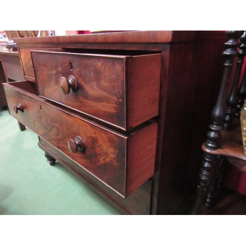 4136 - A 19th Century black line inlaid flame mahogany chest of two short over two long drawers on turned f... 