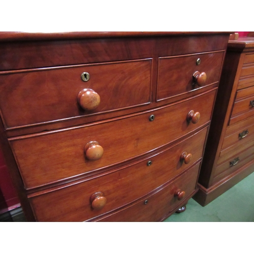 4146 - A circa 1850 flame mahogany bow front chest of two short over three graduating long drawers with bun... 