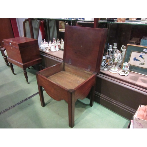 4207 - A 19th Century mahogany lamp table with hinged lid over a shaped apron and chamfered square legs, 48... 