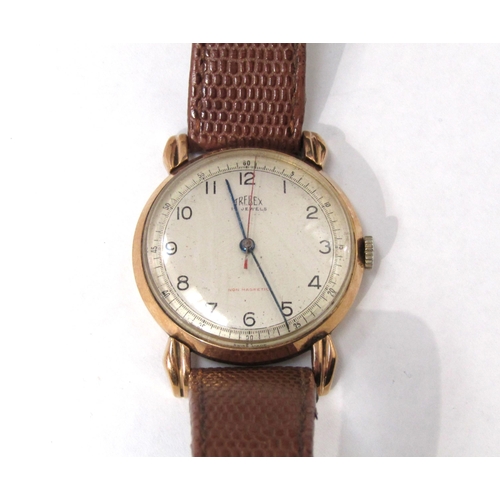 8170 - A 1950's 'Trebex' 9ct gold cased gentleman's wristwatch, Arabic numerated dial, Deco style lugs, on ... 