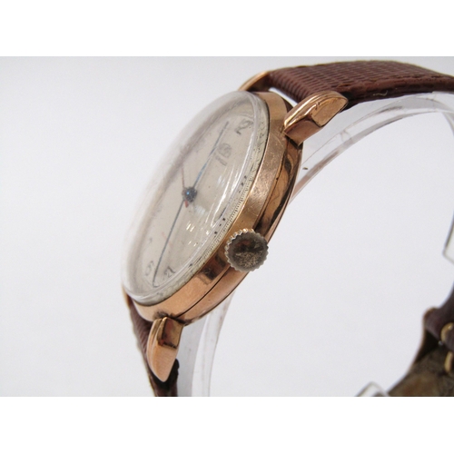 8170 - A 1950's 'Trebex' 9ct gold cased gentleman's wristwatch, Arabic numerated dial, Deco style lugs, on ... 