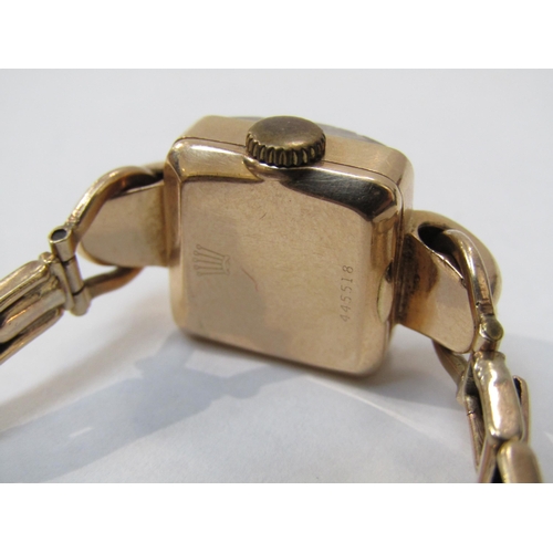 8178 - ROLEX: A mid 20th Century 18ct gold cased ladies Rolex wristwatch on a 9ct gold expandable strap, 17... 