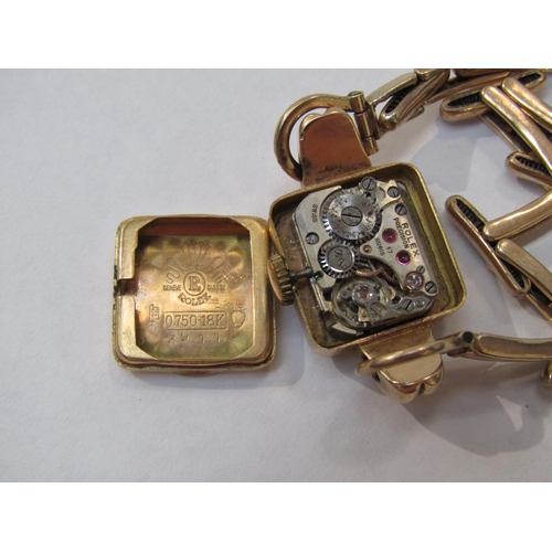 8178 - ROLEX: A mid 20th Century 18ct gold cased ladies Rolex wristwatch on a 9ct gold expandable strap, 17... 