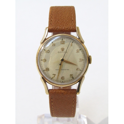 8150 - ROLEX: A Rolex 9ct gold cased gentleman's wristwatch on pigskin leather strap, the textured honeycom... 