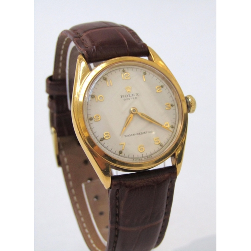 8152 - ROLEX: A Rolex Oyster gentleman's wristwatch on leather strap, the gold plated case with screw on st... 