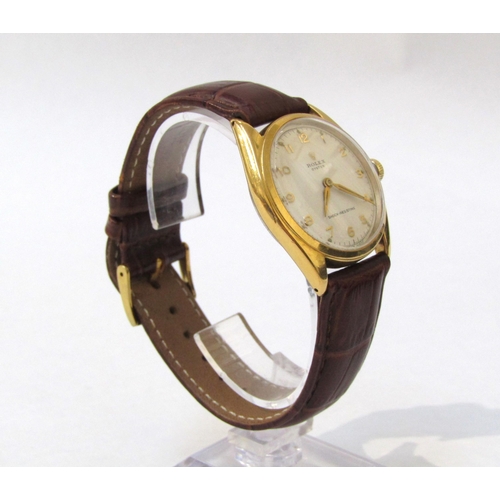 8152 - ROLEX: A Rolex Oyster gentleman's wristwatch on leather strap, the gold plated case with screw on st... 