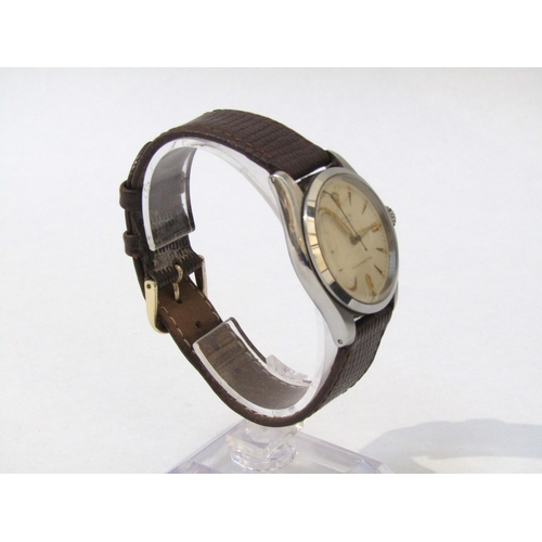 8151 - ROLEX: A Rolex Oyster steel screw back cased gentleman's wristwatch on lizard leather strap, light c... 