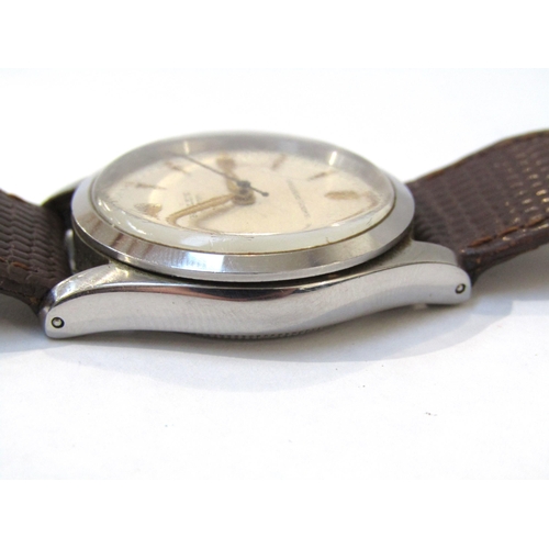 8151 - ROLEX: A Rolex Oyster steel screw back cased gentleman's wristwatch on lizard leather strap, light c... 