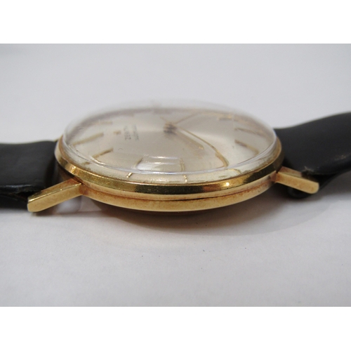 8182 - ZENITH: An 18ct gold cased Zenith automatic wristwatch on leather strap, dial with baton markers, ce... 