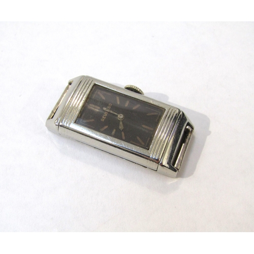 8173 - A rare early 1930s 18ct white gold Reverso ladies wristwatch, the black dial with baton markers and ... 