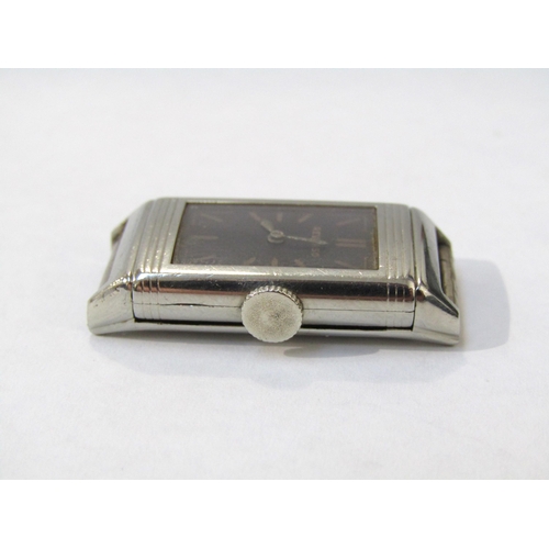 8173 - A rare early 1930s 18ct white gold Reverso ladies wristwatch, the black dial with baton markers and ... 