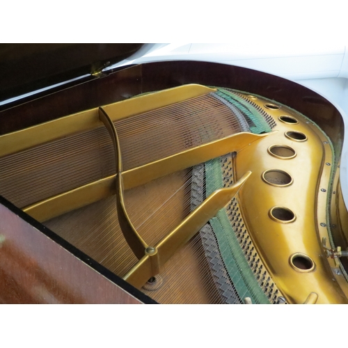 5025 - A C. Kemmler & Co. of Osnabruck baby grand piano, walnut cased, raised on turned and reeded supports... 