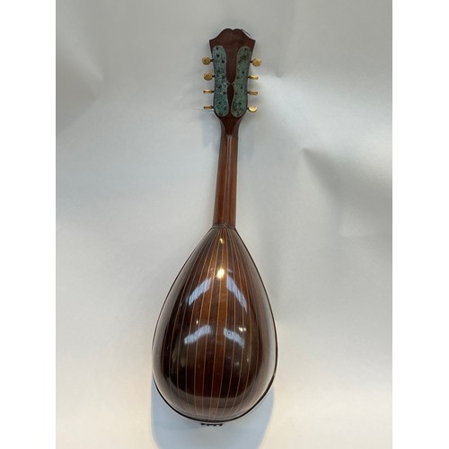 5091 - An early 20th Century Pietro Tonelli of Napoli round-back mandolin, inlaid with mother of pearl, ros... 