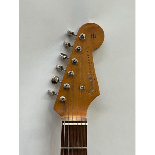 5107 - A Fender Stratocaster made in Japan (MIJ) circa  1993-94, Foto-Flame Crimson body, made in the Fuji-... 