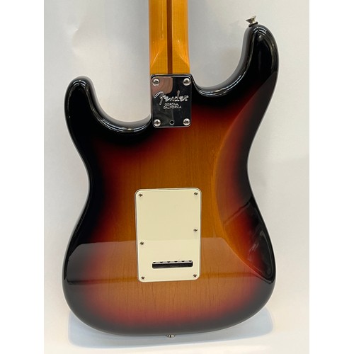 5105 - A Fender American Stratocaster electric guitar, approx 2004, sunburst body, white scratch plate, WD ... 