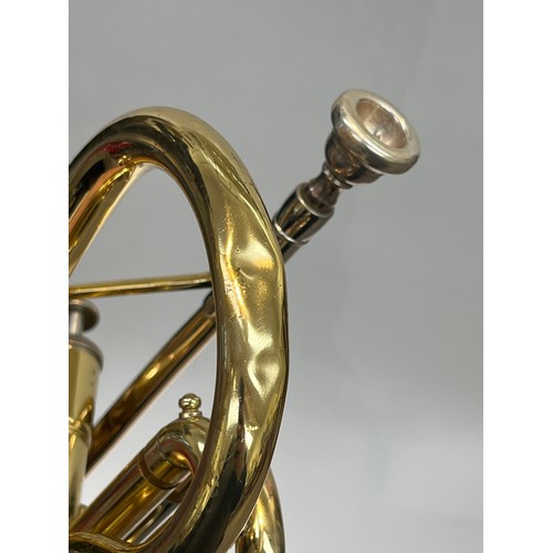 5069 - A Yamaha Bb cornet, brass, with Ritter case with accessories, music stand and books