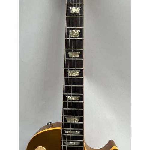 5111 - A circa 1973-75 Gibson USA Les Paul Deluxe model 'Gold Top' electric guitar, serial number 898859, w... 