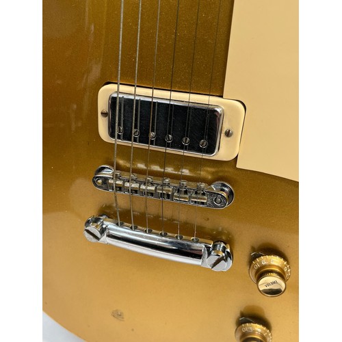 5111 - A circa 1973-75 Gibson USA Les Paul Deluxe model 'Gold Top' electric guitar, serial number 898859, w... 