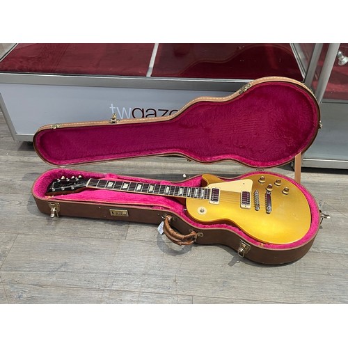 5111 - A circa 1973-75 Gibson USA Les Paul Deluxe model 'Gold Top' electric guitar, serial number 898859, w... 