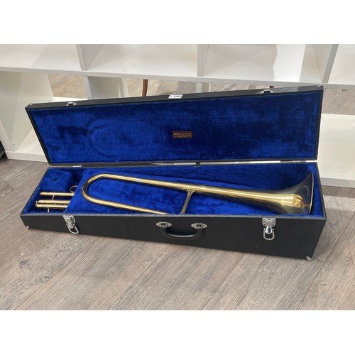 5066 - A Michael White valve trombone, cased