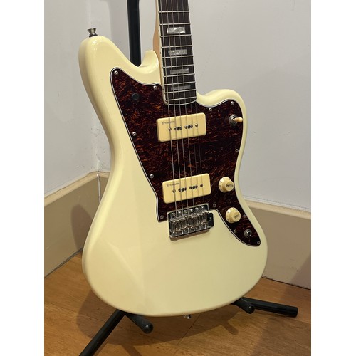 5088 - A Revelation RJT-60 model Jazzmaster style electric guitar, cream body with tortoiseshell effect gua... 