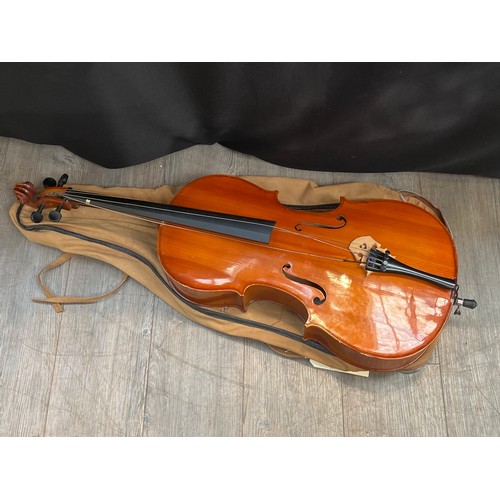 5067 - A Stentor Student quarter size (1/4) cello, canvas cased with bow