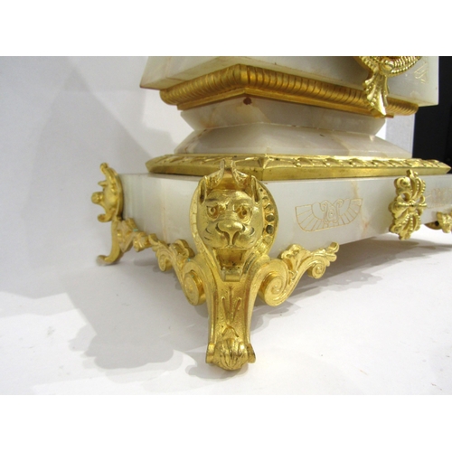 8049 - A large French onyx and gilt metal mantel clock of Egyptian design, scroll and cat form feet, engrav... 