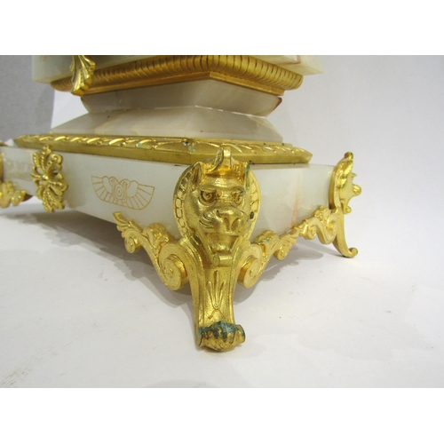 8049 - A large French onyx and gilt metal mantel clock of Egyptian design, scroll and cat form feet, engrav... 