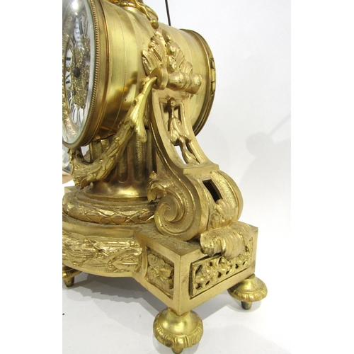 8036 - A 19th Century French gilt metal mantel clock, the movement drum held by a column, with acanthus and... 