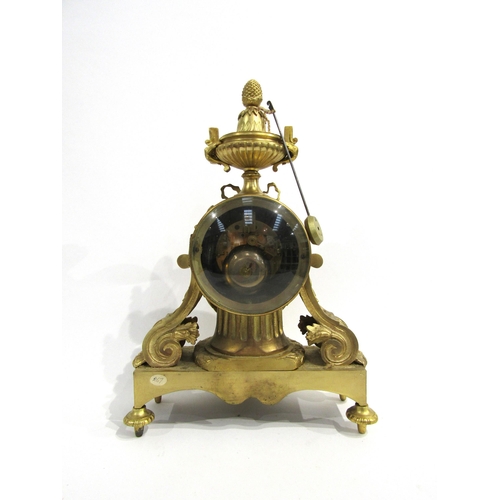 8036 - A 19th Century French gilt metal mantel clock, the movement drum held by a column, with acanthus and... 