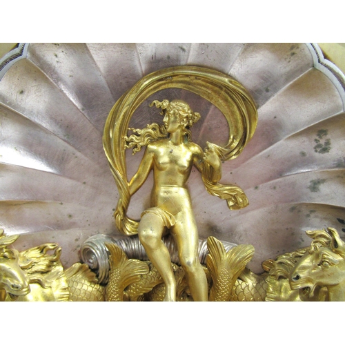 8046 - A 19th Century French gilt metal mantel clock depicting Amphitrite, wife of Poseidon. Central silver... 