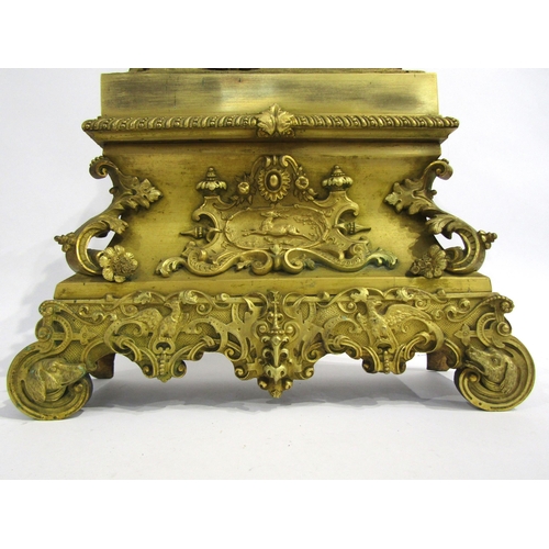 8047 - A 19th Century French gilt metal mantel clock by Henry Marc of Paris, the ornate base with dog head ... 