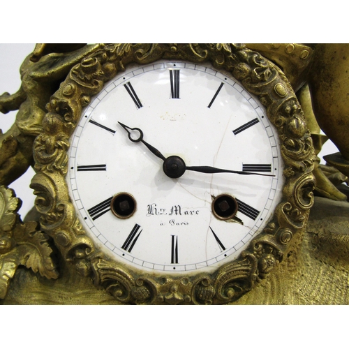 8047 - A 19th Century French gilt metal mantel clock by Henry Marc of Paris, the ornate base with dog head ... 