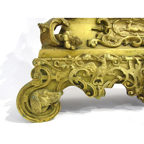 8047 - A 19th Century French gilt metal mantel clock by Henry Marc of Paris, the ornate base with dog head ... 