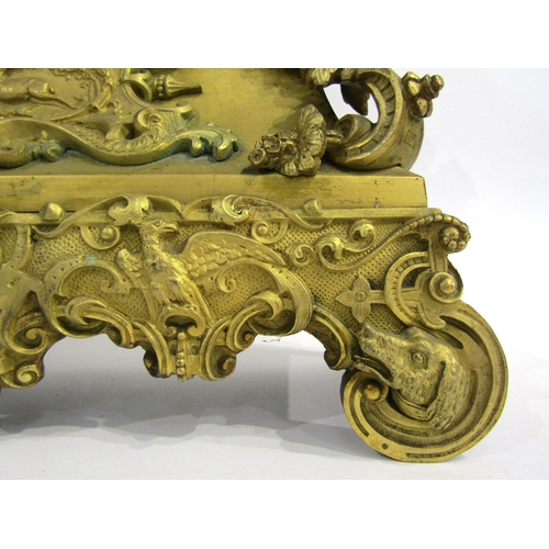 8047 - A 19th Century French gilt metal mantel clock by Henry Marc of Paris, the ornate base with dog head ... 