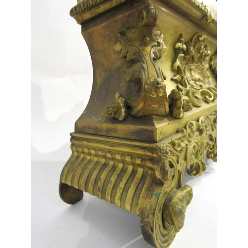 8047 - A 19th Century French gilt metal mantel clock by Henry Marc of Paris, the ornate base with dog head ... 