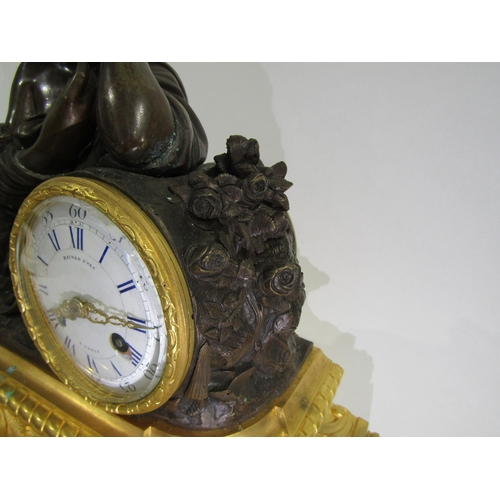 8061 - A 19th Century French bronze and ormolu/gilt metal mantel clock by Raingo Freres of Paris, the acant... 