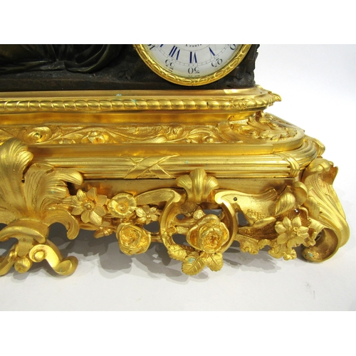 8061 - A 19th Century French bronze and ormolu/gilt metal mantel clock by Raingo Freres of Paris, the acant... 