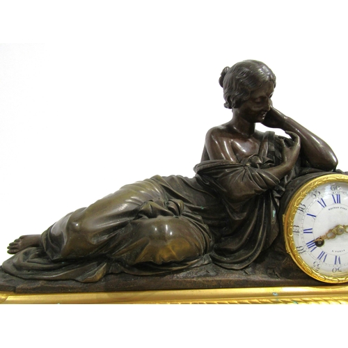 8061 - A 19th Century French bronze and ormolu/gilt metal mantel clock by Raingo Freres of Paris, the acant... 